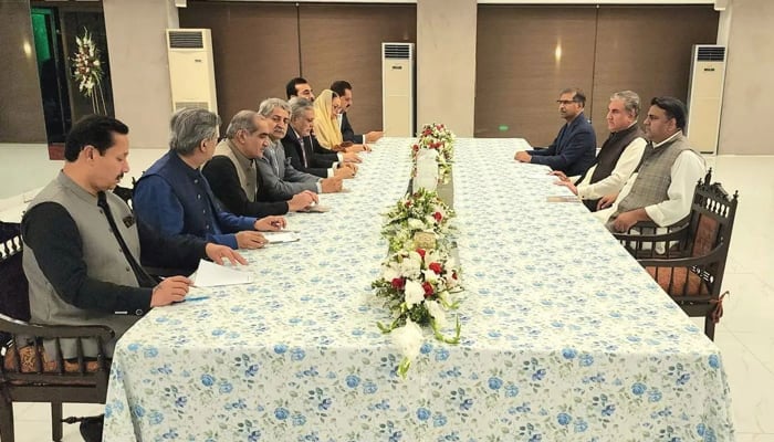 Coalition government (left) and Pakistan Tehreek-e-Insaf (PTI) leaders are pictured during election talks in Islamabad on May 2, 2023. — Facebook/SMQureshi.Official