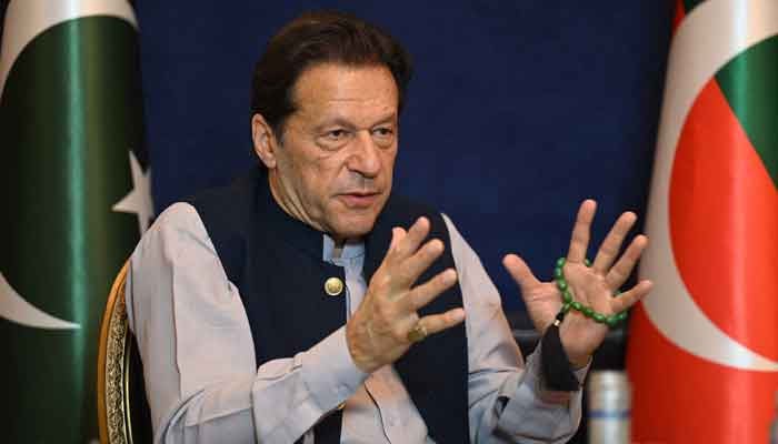 Former prime minister Imran Khan speaks during an interview at his residence in Lahore on March 15, 2023. — AFP