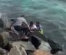 Police officers rescue man drifting at sea after fainting