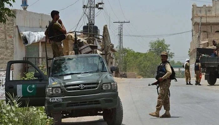 Pakistan Army personnel are seen patrolling in an area. — AFP/File