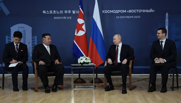 This image shows Russian President Vladimir Putin (2nd R) and North Koreas leader Kim Jong Un (2nd L) during their meeting at the Vostochny Cosmodrome in Amur region on September 13, 2023. — AFP