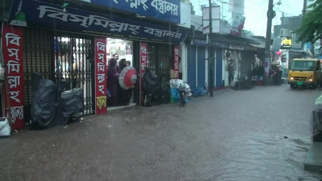 The undated image shows a road in Natore district submerged in water due to heavy rain. Photo: UNB