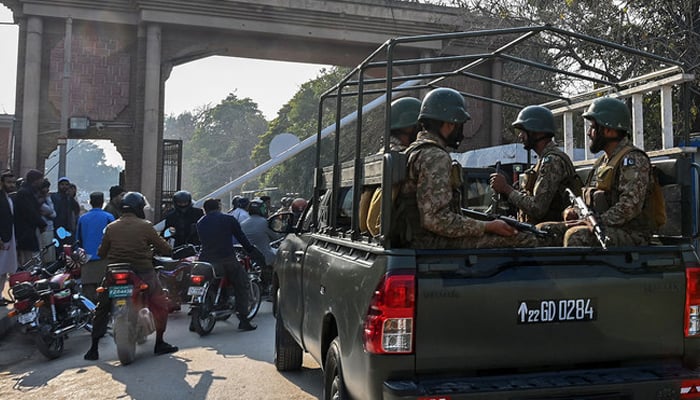 Pakistans army soldiers patrol outside the police headquarters a day after a mosque blast in Peshawar on January 31, 2023. —AFP