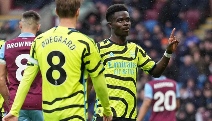 Arsenals Bukayo Saka (C) celebrates after scoring against Burnley. — AFP