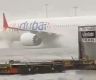 Flooding in Dubai turns planes into boats