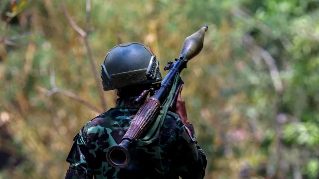 File Image: A soldier from the Karen National Liberation Army (KNLA) carries an RPG launcher at a Myanmar military base at Thingyan Nyi Naung village on the outskirts of Myawaddy, the Thailand-Myanmar border town under the control of a coalition of rebel forces led by the Karen National Union, in Myanmar, April 15, 2024. Photo: Reuters