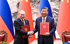  弘扬和平共处五项原则，成为新型国际关系典范，中俄元首会晤吸引全球目光