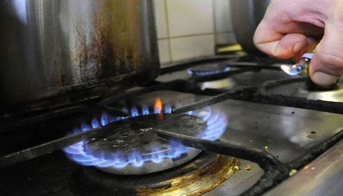 A person can be seen lighting a stove. — AFP File