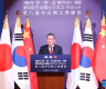 Chinese premier urges China, Japan, S. Korea to reject external disruption