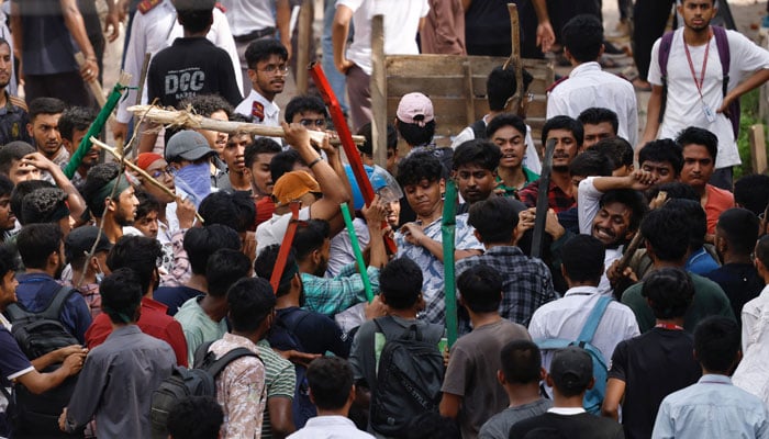 Bangladesh Chhatra League, the student wing of the ruling party Bangladesh Awami League, and anti-quota protesters engage in a clash in the Dhaka College area, in Dhaka, Bangladesh, July 16, 2024. — Reuters