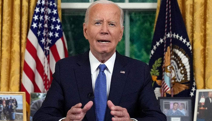 US President Joe Biden speaks during an address to the nation about his decision to not seek reelection, in the Oval Office at the White House in Washington, DC, on July 24, 2024. — AFP