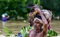 Flooding forces 300,000 Bangladeshis into shelters