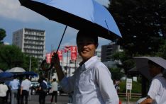 高温炙烤打破性别刻板印象，韩国男性加入“阳伞一族”