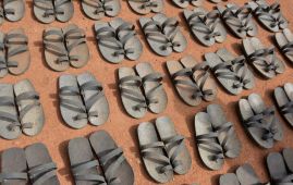 Artisans offer cheap footwear made from rubber tires