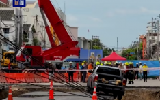 Bangkok Road Collapse Forms Massive Sinkhole