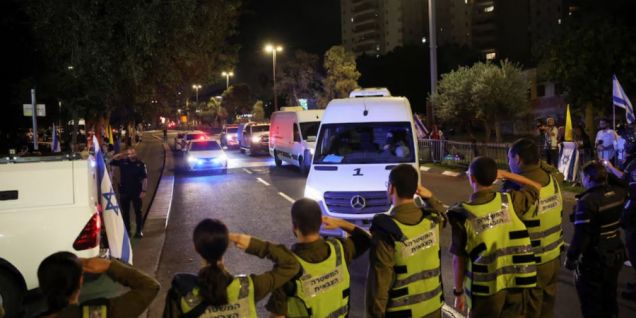 Hamas hands over hostage bodies after Israel threatens aid cut