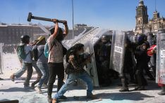 Thousands protest against government in Mexico as clashes leave 120 injured