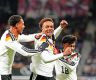Germany, Netherlands reach World Cup after big wins