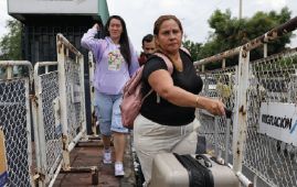 Millions of Venezuelans await next moves across region