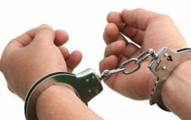 Two arrested on charge of taking youth hostage