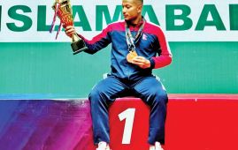 Dahal shines with double Gold in South Asian badminton